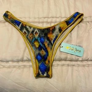 NWT Luli fama Moondust Luxe stitch leg